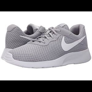 women’s grey nike running/training shoes